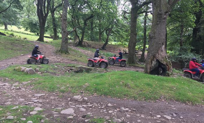 Quad Biking through the woods at Taff Valley